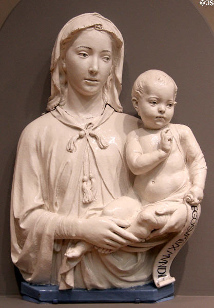 Madonna & Child with Scroll glazed terracotta figure (c1455) by Luca della Robbia of Florence at Metropolitan Museum of Art. New York, NY.