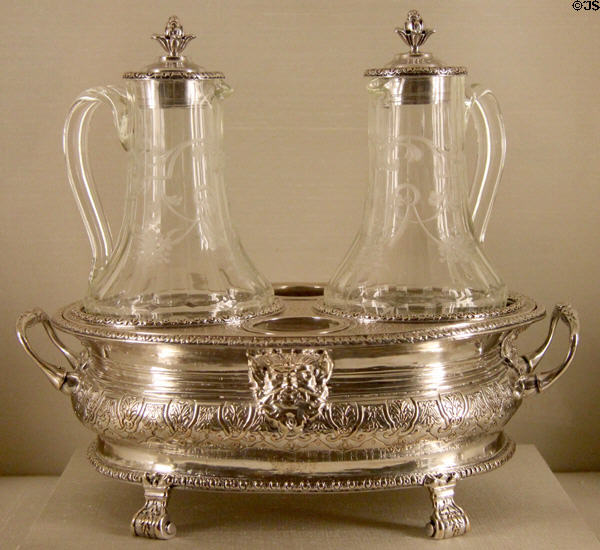 Silver cruet frame with later glass bottles (1717-22) from Paris, France at Metropolitan Museum of Art. New York, NY.