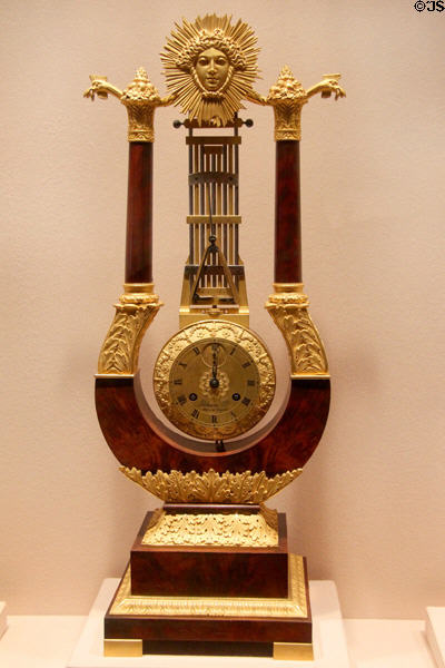 Clock in form of an oscillating pendulum (1815-30) by Delaunoy Her. Eleve de Breguet of France at Metropolitan Museum of Art. New York, NY.