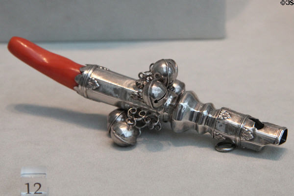 Silver & coral child's rattle, whistle & bells teething toy (c1735-45) by Peter Van Dyck or Richard Van Dyck of New York City at Metropolitan Museum of Art. New York, NY.