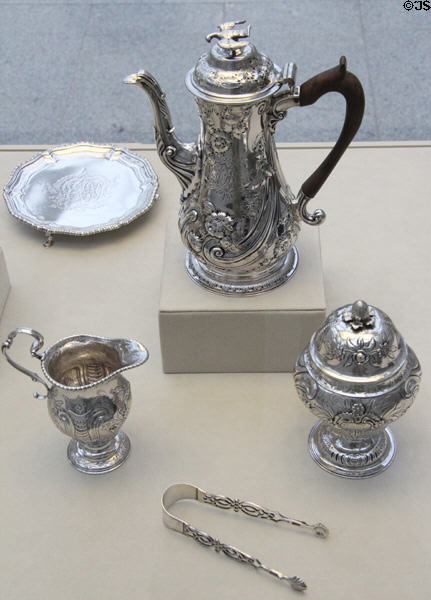 Silver coffeepot (1761-2) by Robert Peaston & William Peaston of London plus sugar bowl, creampot & tongs (c1772) by Myer Myers of New York City at Metropolitan Museum of Art. New York, NY.