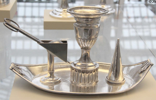 Silver candleholder with snuffer & douter (1790-1810) by Joseph Lownes of Philadelphia at Metropolitan Museum of Art. New York, NY.