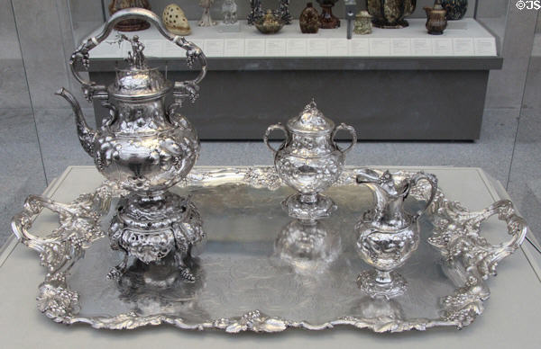 Silver tea service on tray (1850) by John C. Moore of New York City for retail by Ball, Tompkins & Black at Metropolitan Museum of Art. New York, NY.