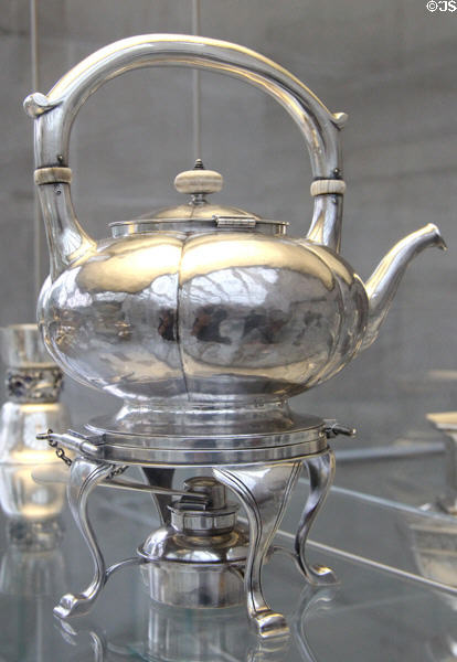 Silver Arts & Crafts teakettle on stand (c1910) by James T. Woolley of Boston at Metropolitan Museum of Art. New York, NY.