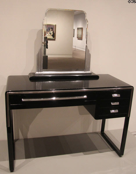 American Modern style vanity table & mirror (c1932) by Norman Bel Geddes for Simmons Furniture Co. of Chicago, IL at Metropolitan Museum of Art. New York, NY.