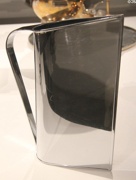 Chrome plated Normandie water pitcher (1935) by Peter Müller-Munk for Revere Copper & Brass Co. of Rome, NY at Metropolitan Museum of Art. New York, NY.