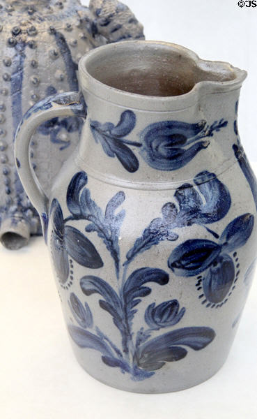 Stoneware pitcher painted with cobalt blue (1848-80) by John Bell Pottery of Waynesboro, PA at Metropolitan Museum of Art. New York, NY.