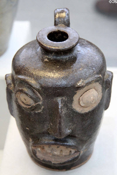 Stoneware face jug (c1860-70) from Edgefield District, South Carolina at Metropolitan Museum of Art. New York, NY.