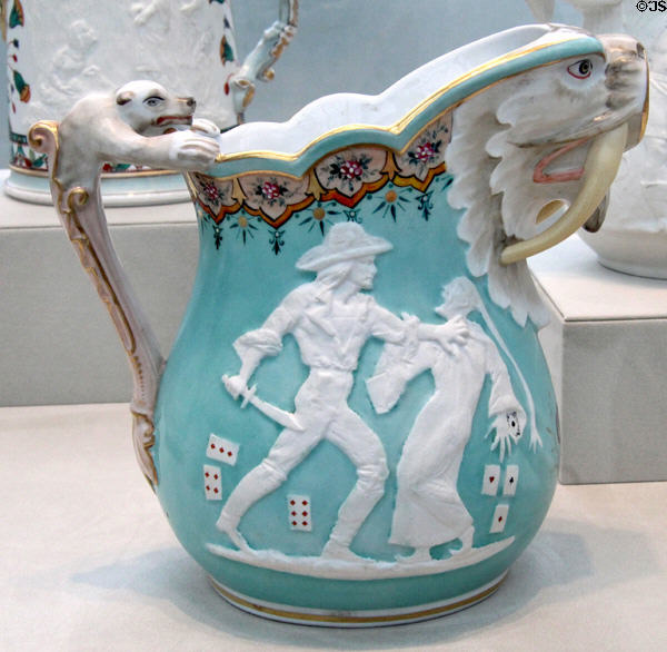 Porcelain Bret Harte pitcher (1875) by Karl L.H. Müller made by Union Porcelain Works, Greenpoint, Brooklyn at Metropolitan Museum of Art. New York, NY.