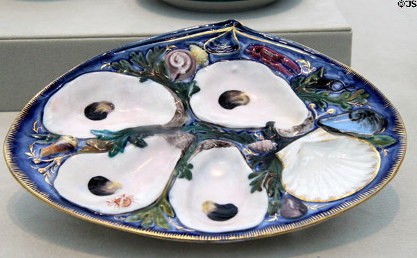 Porcelain oyster plate (1881) by Karl L.H. Müller made by Union Porcelain Works, Greenpoint, Brooklyn at Metropolitan Museum of Art. New York, NY.