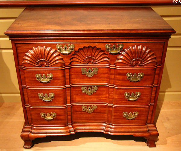 Chest of drawers with heavy block & shell carvings (1765) from Newport, RI by John Townsend at Metropolitan Museum of Art. New York, NY.