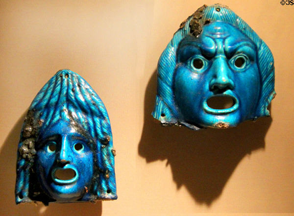 Faience miniature theatrical masks (2ndC CE) said to be from a burial at Medinet el-Fayum in Egypt at Metropolitan Museum of Art. New York, NY.