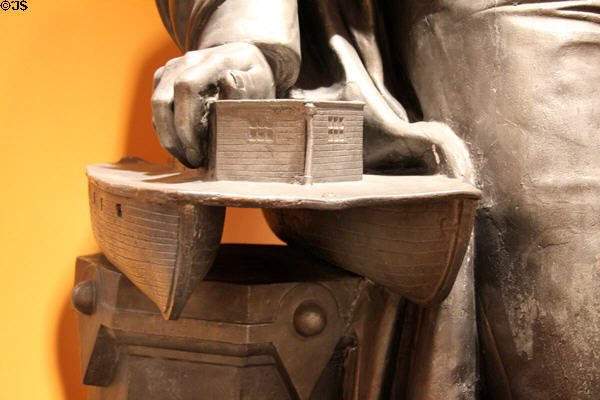 Detail of Robert Fulton sculpture (1872) by Caspar Buberl shows inventor's hand on first steamboat at Brooklyn Museum. Brooklyn, NY.