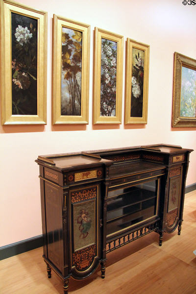 Sideboard with marquetry (c1872) by Herter Brothers of New York below Botanical paintings (1882) by Elizabeth Boott Duveneck at Brooklyn Museum. Brooklyn, NY.