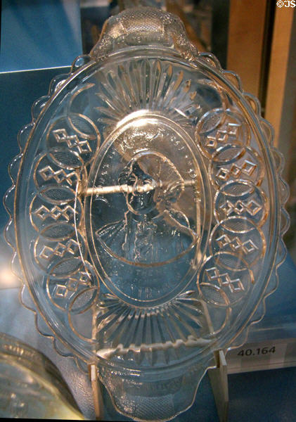 Pressed glass American Centennial plate of George Washington "First in War, First in Peace, First in the Hearts of his Countrymen" at Brooklyn Museum. Brooklyn, NY.