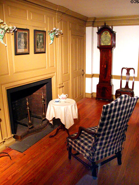 Parlor from Dr. Ezekiel Porter House (c1755) with original Queen Anne-style three-sided chair (c1755) of Wethersfield, CT & tall clock (1780-1820) by Aaron Willard at Brooklyn Museum. Brooklyn, NY.