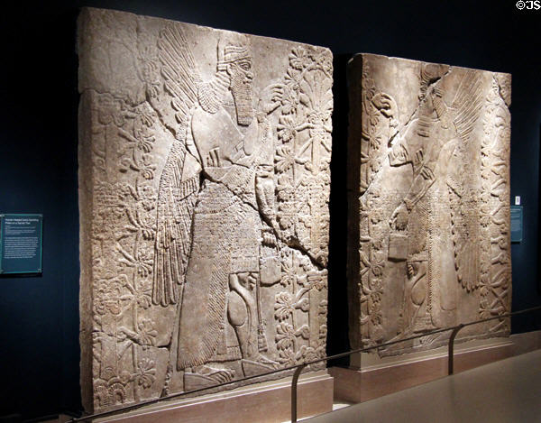 Two reliefs of Assyrian genies (883-859 BCE) from King Ashur-nasir-pal II palace of Nimrud at Brooklyn Museum. Brooklyn, NY.
