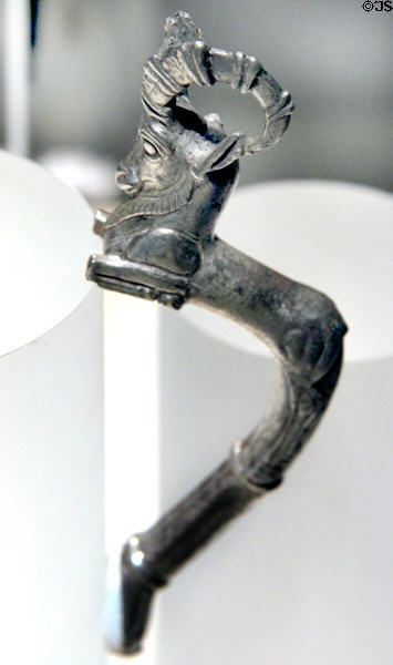 Egyptian silver vessel handle in shape of bounding ibex in Persian style (late 5thC BCE) probably from Tell el-Maskhuta, Egypt at Brooklyn Museum. Brooklyn, NY.