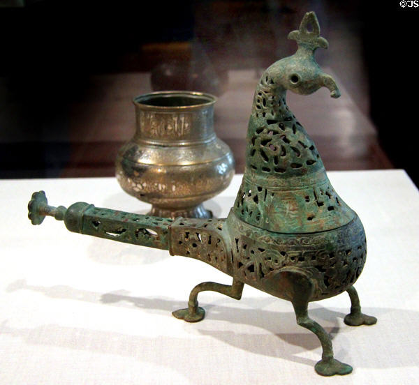 Copper alloy incense burner in shape of bird (12th-13thC) from Iran at Brooklyn Museum. Brooklyn, NY.