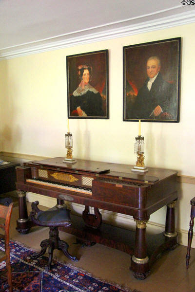 Piano under portraits at Lefferts Homestead museum. Brooklyn, NY.