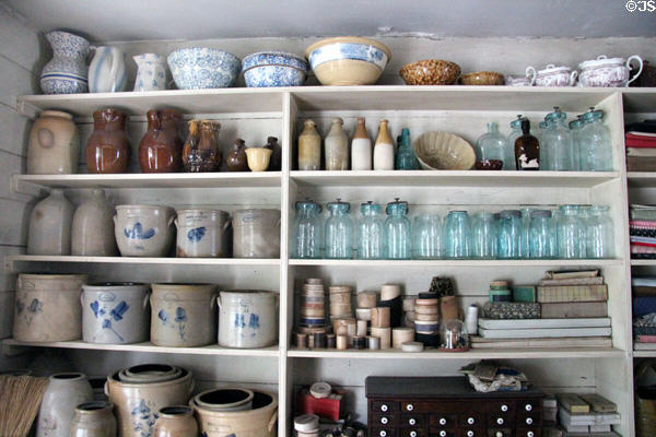Stoneware crocks, ceramics, glass canning jars & boxes in Layton General Store at Old Bethpage Village. Old Bethpage, NY.