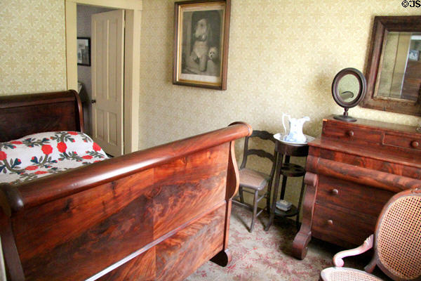 Bedroom in Layton Home at Old Bethpage Village. Old Bethpage, NY.
