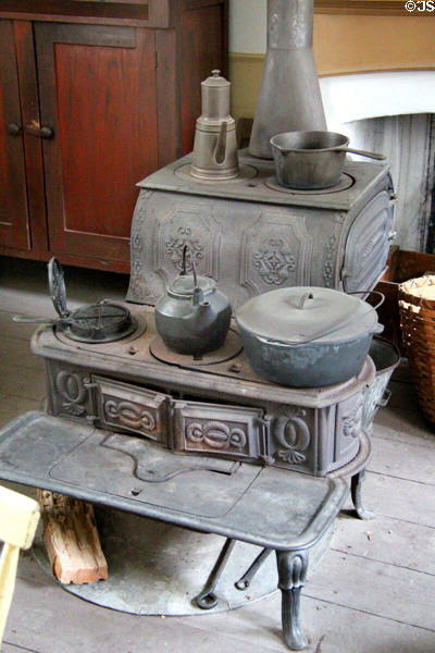 Cast iron kitchen stove in Layton Home at Old Bethpage Village. Old Bethpage, NY.