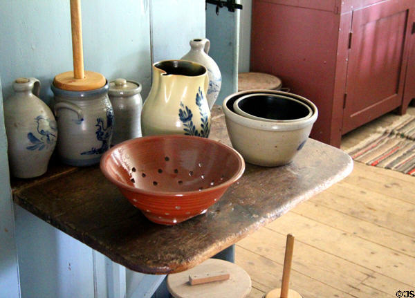 Stoneware & ceramic vessels in kitchen of Williams House at Old Bethpage Village. Old Bethpage, NY.