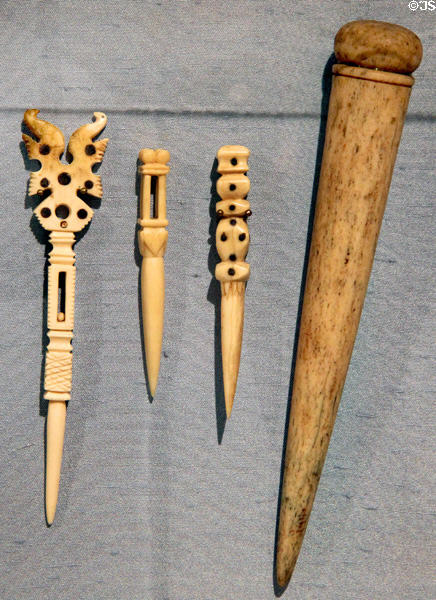 Whale ivory bodkins used to tie knot or weave thin ropes & larger fid used by sailmaker at Whaling Museum. Cold Spring Harbor, NY.