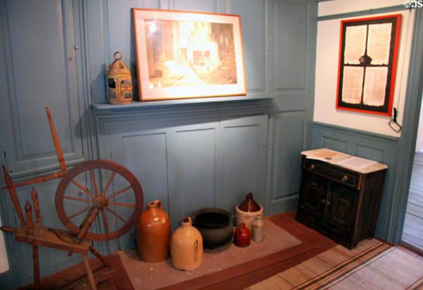 Spinning wheel & stoneware jugs at Annie Cooper Boyd House museum. Sag Harbor, NY.