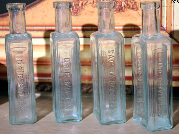 Medicine bottles etched with the name of Dr. E. Miles of Sag Harbor at Annie Cooper Boyd House museum. Sag Harbor, NY.