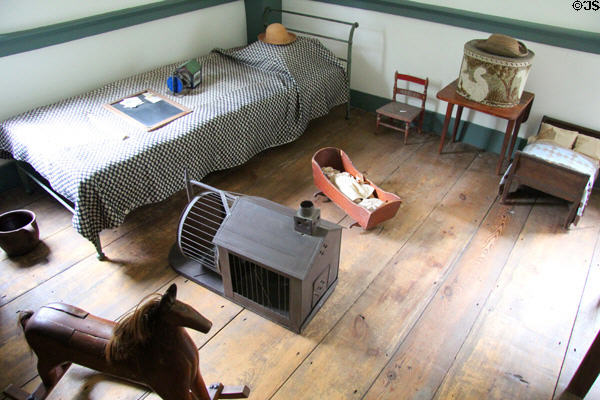 Child's bedroom, toys & squirrel cage at Custom House Museum. Sag Harbor, NY.