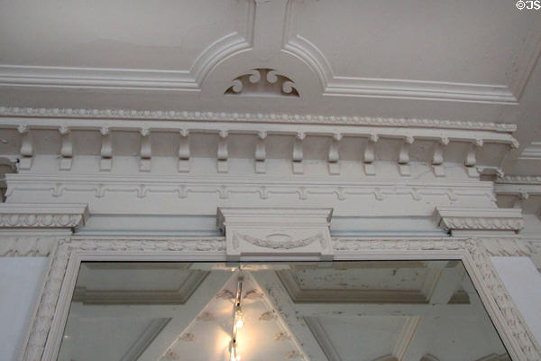Neoclassical ornamentation above interior door at Sag Harbor Whaling Museum. Sag Harbor, NY.