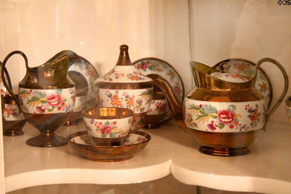 Lusterware copper tea & coffee service with floral design on white banding at Home Sweet Home Museum. East Hampton, NY.
