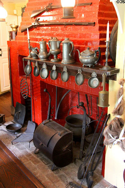 Kitchen open fireplace with cooking & serving implements & collection of pewter antiques at Home Sweet Home Museum. East Hampton, NY.
