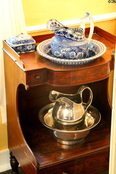 Blue & white & silver pitcher & basin washing sets at Home Sweet Home Museum. East Hampton, NY.