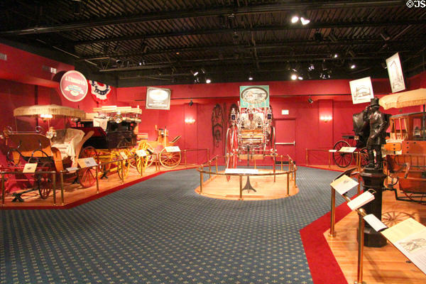 Gallery displays carriage collection of Long Island Museum. Stony Brook, NY.
