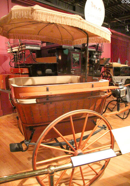 Governess Cart with door at rear to keep children away from horses for safety (1906) by Brewster & Co. of New York City at carriage collection of Long Island Museum. Stony Brook, NY.