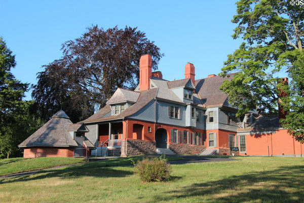 Queen Anne architecture of house at Sagamore Hill National Historic Site with octagonal ice house. Cove Neck, NY.