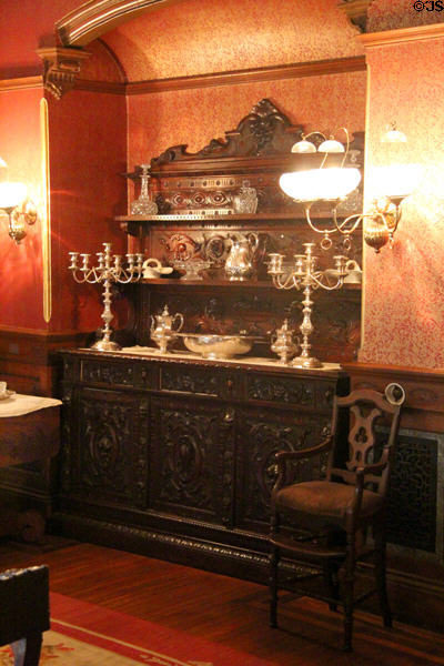 Sideboard with silver candlesticks in dining room at Roosevelt's House Sagamore Hill NHS. Cove Neck, NY.
