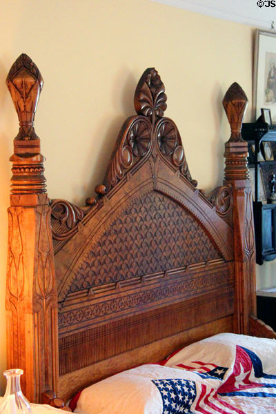Daniel Pabst & Frank Furness headboard in master bedroom at Roosevelt's House Sagamore Hill NHS. Cove Neck, NY.