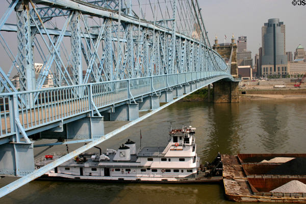 Barge below Roebling Suspension Bridge & skyline. Cincinnati, OH.