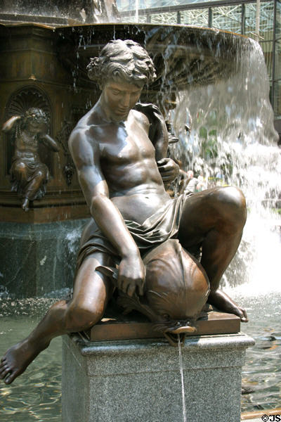 Detail of youth with spitting dolphin on Tyler Davidson Fountain in Fountain Square. Cincinnati, OH.