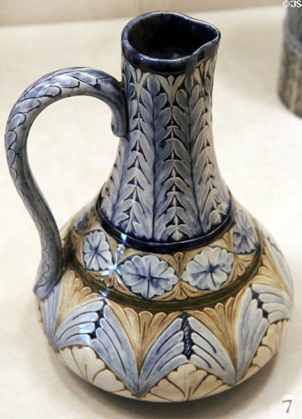 Earthenware blue & brown pitcher (1883) by Abby Hyde Allen of Rookwood Pottery Co. of Cincinnati at Cincinnati Art Museum. Cincinnati, OH.
