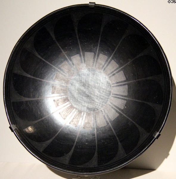 Black on black ceramic plate (c1923) by Maria Martinez & Julian Martinez of San Ildefonso Pueblo, NM at Cincinnati Art Museum. Cincinnati, OH.