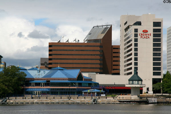 Skyline of Toledo with SeaGate Center pavilion at Maumee River park, brown Four SeaGate & Two SeaGate (Crowne Plaza) buildings. Toledo, OH.