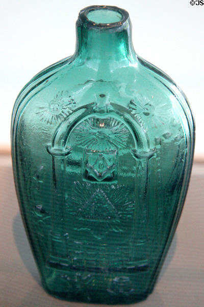 Mold blown glass flask with Masonic symbols (1822-38) from Zanesville, OH at Toledo Glass Pavilion. Toledo, OH.