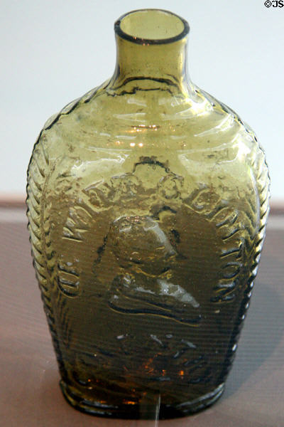 Mold blown glass flask with bust of De Witt Clinton (1824-30) from Coventry, CT at Toledo Glass Pavilion. Toledo, OH.