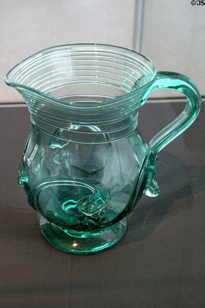 Blown green glass lily pad pitcher (1835-40) probably from New York at Toledo Glass Pavilion. Toledo, OH.