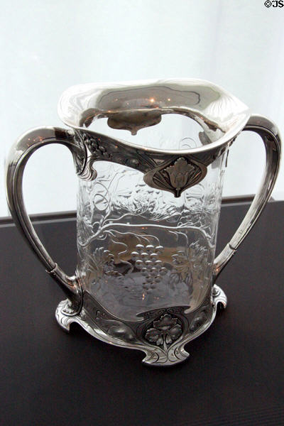 Loving cup with silver mount by T.G. Hawkes Co. of Corning, NY & Gorham Manuf. Co. of Providence, RI at Toledo Glass Pavilion. Toledo, OH.
